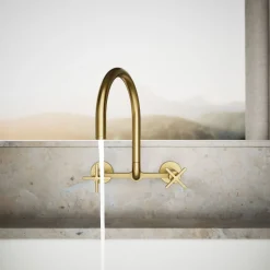 Two-hole wall-mount bridge kitchen sink faucet
