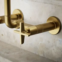 Two-hole wall-mount bridge kitchen sink faucet