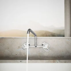 Two-hole wall-mount bridge kitchen sink faucet