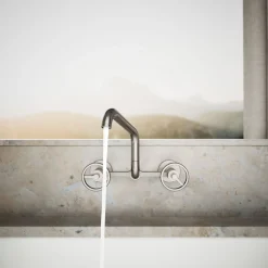 Two-hole wall-mount bridge kitchen sink faucet