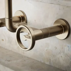 Two-hole wall-mount bridge kitchen sink faucet