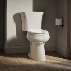 Two-piece elongated comfort height toilet, 1.28 gpf