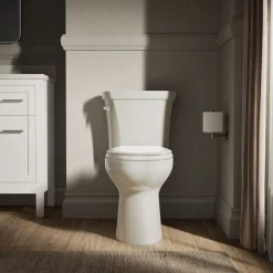 Two-piece elongated toilet, 1.28 gpf