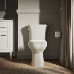 Two-piece elongated toilet, 1.28 gpf