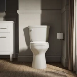 Two-piece elongated toilet, 1.28 gpf
