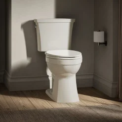 Two-piece elongated toilet, 1.28 gpf