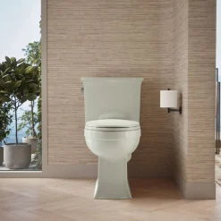 Two-piece elongated toilet, 1.28 gpf