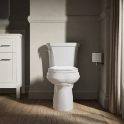 Two-piece elongated toilet, 1.28 gpf