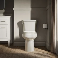 Two-piece elongated toilet, 1.28 gpf