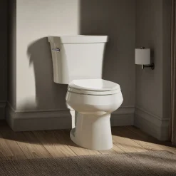 Two-piece elongated toilet, 1.28 gpf