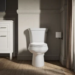 Two-piece elongated toilet, 1.28 gpf