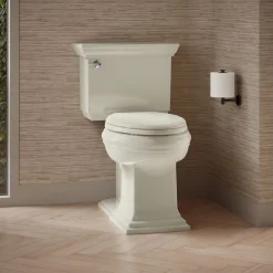 Two-piece elongated toilet with concealed trapway, 1.28 gpf