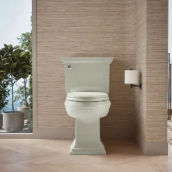 Two-piece elongated toilet with concealed trapway, 1.28 gpf