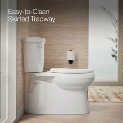 Two-piece elongated toilet with skirted trapway, 1.28 gpf
