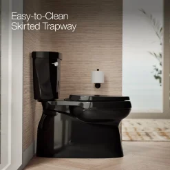 Two-piece elongated toilet with skirted trapway, 1.28 gpf