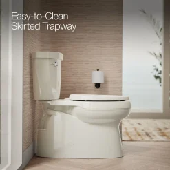Two-piece elongated toilet with skirted trapway, 1.28 gpf