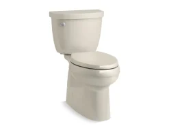 Two-piece elongated toilet with skirted trapway, 1.28 gpf
