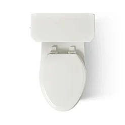 Two-piece elongated toilet with skirted trapway, 1.28 gpf