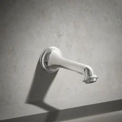 Wall-mount bath spout with turned design