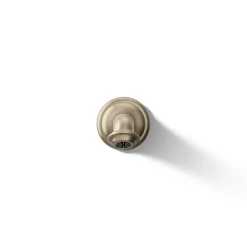 Wall-mount bath spout with turned design